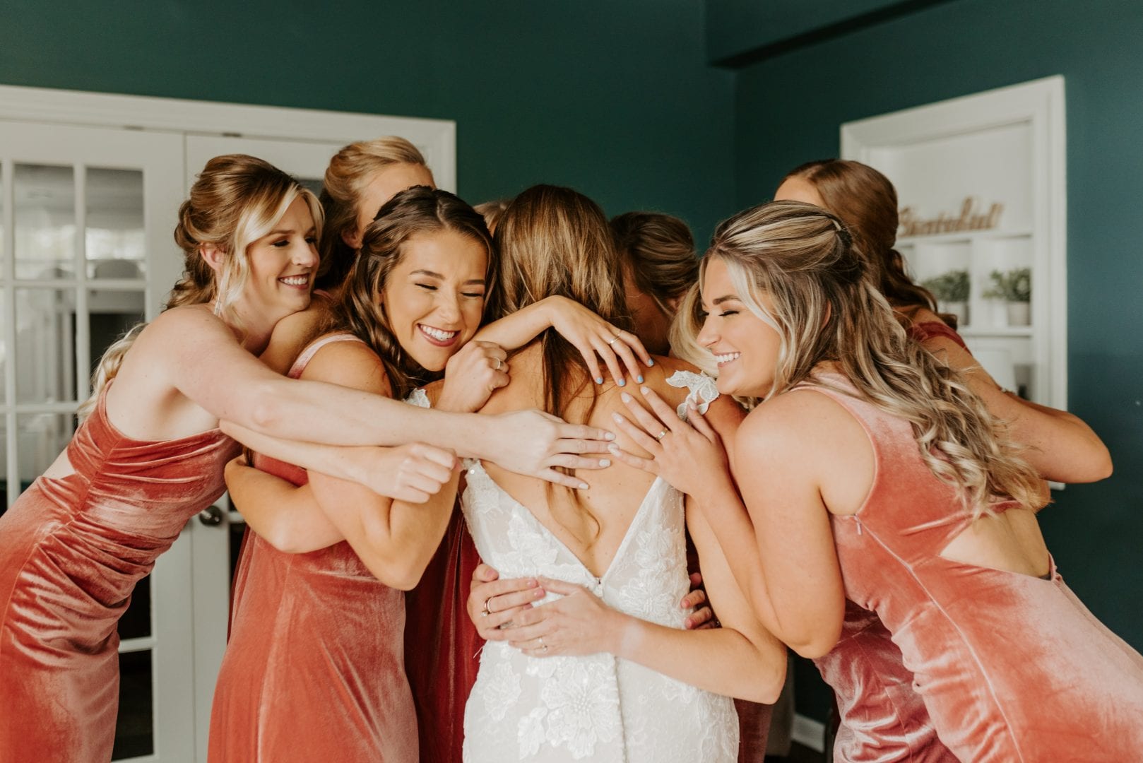 This photo is from my wedding, and it has nothing to do with job searching... BUT consider group coaching like one big team huddle/group hug! 